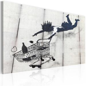 Obraz - Padající žena s vozíkem v supermarketu (Banksy) 60x40