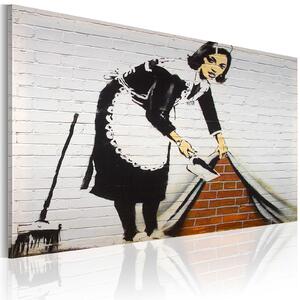 Obraz - Uklízečka (Banksy) 60x40