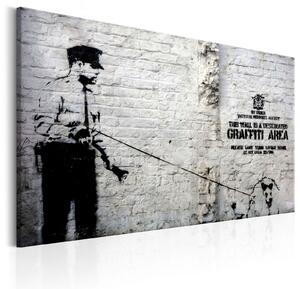 Obraz - Graffiti: Policista se psem (Banksy) 60x40