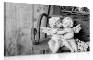Obraz sošky andílků na lavičce v černobílém provedení
