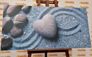 Obraz srdce z kamene na písečném pozadí
