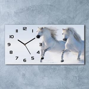 Skleněné hodiny na stěnu Dva koně ve sněhu pl_zsp_60x30_f_46568530