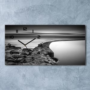 Skleněné hodiny na stěnu Kamenná pláž pl_zsp_60x30_f_86464123