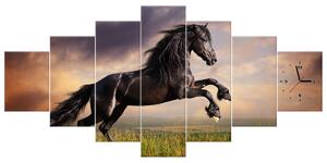 Obraz s hodinami Silný černý kůň - 7 dílný Rozměry: 160 x 70 cm