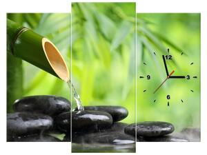 Obraz s hodinami Bambusový pramínek a kameny - 3 dílný Rozměry: 90 x 70 cm