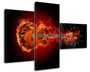 Obraz s hodinami Hořící kytara - 3 dílný Rozměry: 90 x 30 cm