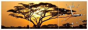 Obraz s hodinami Akácie v Serengeti - 3 dílný Rozměry: 30 x 90 cm