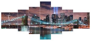 Obraz s hodinami Panorama Manhattanu - 7 dílný Rozměry: 160 x 70 cm