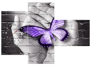 Obraz s hodinami Fialový motýl na dlaních - 3 dílný Rozměry: 100 x 70 cm