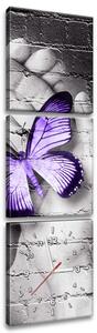 Obraz s hodinami Fialový motýl na dlaních - 3 dílný Rozměry: 100 x 70 cm
