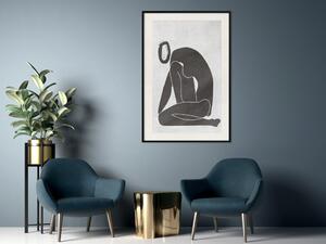 Plakát Postava v zadumání - tmavá silueta klečící ženy na šedém pozadí