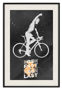 Plakát Triumfující cyklista - chlapec na kole a motivační slogan