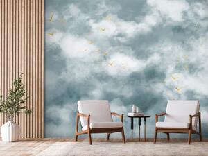 Fototapeta Let svobody - oblaka na nebi v pastelových odstínech a abstraktní zlatí ptáci