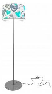 Mladá moderní stojací lampa se stínidlem