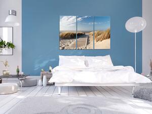 Obraz Letní krajina (3-dílný) - pláž s pískem nad bouřlivým mořem