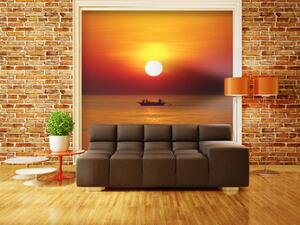 Fototapeta Západ slunce s rybářskou lodí