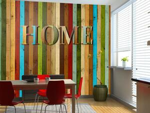 Fototapeta Home - barevný nápis domů na pestrých dřevěných deskách svislých