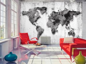 Fototapeta Svět v odstínech šedi - mapa světa na retro dřevěném pozadí