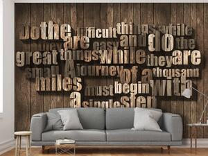 Fototapeta Motivační citát - nápis v angličtině na pozadí s dřevěnou texturou
