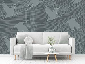 Fototapeta Létající jeřábi - abstrakce ve vzduchu s šedými ptáky