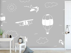Fototapeta Nebezpečný let - kreslené letadla na pozadí šedého nebe s oblaky