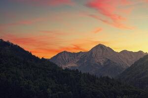 Fototapeta západ slunce na horách - 300x200 cm