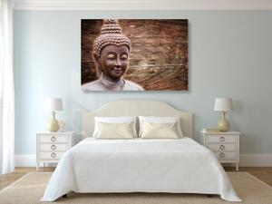 Obraz socha Budhy na dřevěném pozadí - 60x40 cm