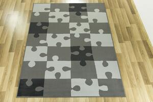 Balta Dětský kusový koberec KIDS 533913/89911 Puzzle šedý Rozměr: 160x225 cm