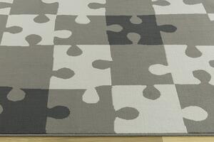 Balta Dětský kusový koberec KIDS 533913/89911 Puzzle šedý Rozměr: 160x225 cm