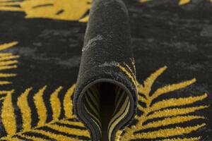 Makro Abra Moderní kusový koberec FESTIVAL 5869A Listy palem černý žlutý Rozměr: 80x150 cm