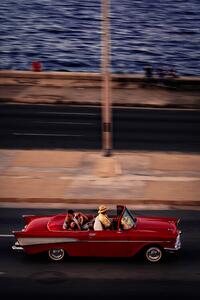 Fotografie Red Car Driving, Andreas Bauer, (26.7 x 40 cm)