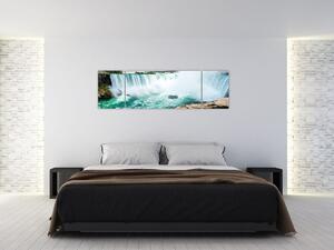 Obraz vodopádů s lodí (170x50 cm)
