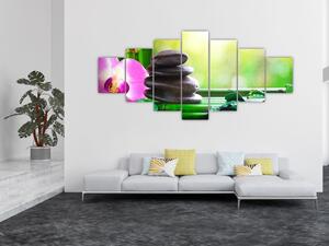 Obraz masážních kamenů a orchidee na vodě (210x100 cm)