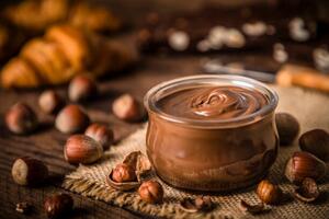Fotografie Crystal jar full of hazelnut and chocolate spread, carlosgaw, (40 x 26.7 cm)