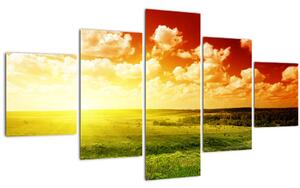 Obraz louky se zářícím sluncem (125x70 cm)