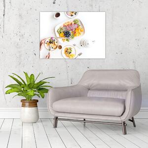 Obraz talířů s ovocem na stole (70x50 cm)