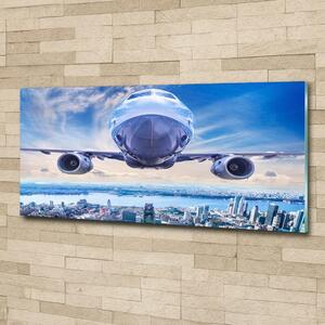 Moderní skleněný obraz z fotografie Letadlo na městem osh-167779538