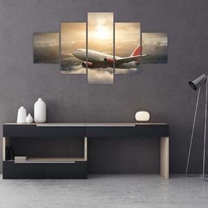 Obraz - Letadlo v oblacích (125x70 cm)