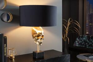 Art deco stolní lampa Uma ve zlatém provedení s kovovou lebkou s černým kulatým stínítkem 56cm