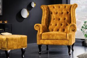 Chesterfield křeslo Cella se sametovým čalouněním v hořčicově žluté barvě s tmavě hnědými masivními nožičkami 105cm