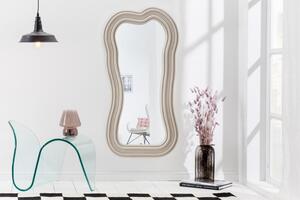 Asymetrické designové zrcadlo Swan s polyuretanovým rámem ve světle béžové barvě s kaskádovým efektem 100cm