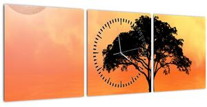 Obraz stromu v západu slunce (s hodinami) (90x30 cm)