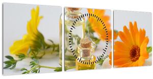 Obraz oranžových květin (s hodinami) (90x30 cm)