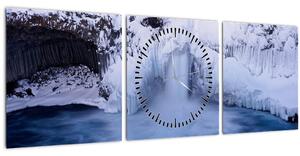 Obraz vodopádu v zimě (s hodinami) (90x30 cm)