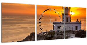 Obraz majáku při západu slunce (s hodinami) (90x30 cm)