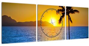 Obraz - Západ slunce nad mořem (s hodinami) (90x30 cm)