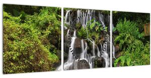 Obraz vodopádů v tropickém lese (s hodinami) (90x30 cm)