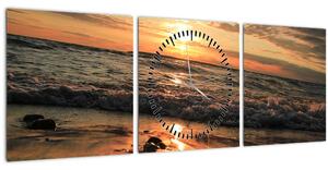 Obraz - Západ slunce do oceánu (s hodinami) (90x30 cm)