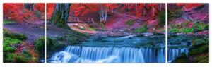Obraz vodopádu v červeném lese (170x50 cm)