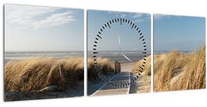Obraz - Písečná pláž na ostrově Langeoog, Německo (s hodinami) (90x30 cm)